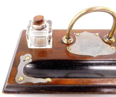 A Victorian walnut and ebonised desk stand, with brass carrying handle, with two recesses holding glass ink wells, and a pen recess, 28cm L, together with a Victorian glass inkwell with hinged brass lid. - 3