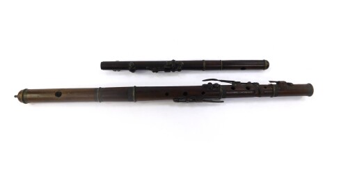A Victorian flute, by J Wallis & Sons, 135 Euston Road, London, together with a rosewood piccolo. (2)