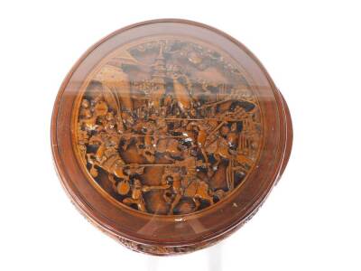 A Chinese hardwood quintetto of occasional tables, the circular main table deeply carved to the top with warriors, frieze carved with figures and landscapes, raised on straight legs and ball and claw feet, with four sectional tables beneath, similarly car - 2