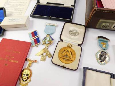 Masonic jewels and ephemera, some silver gilt or gold, many cased, in a brown leather case. - 2