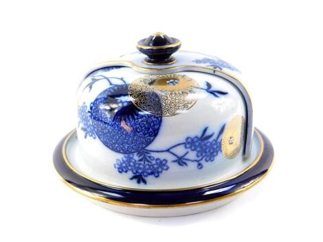 A Doulton late 19thC pottery Leach's Patent cheese dish and domed cover, decorated in blue and gilt with an aesthetic Japan pattern, impressed and printed marks, 22cm Dia.