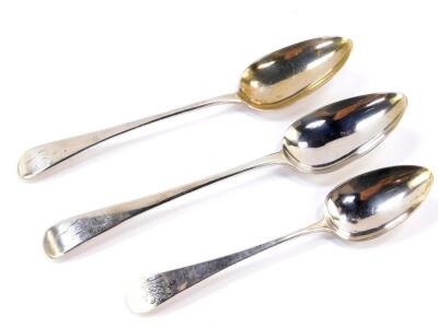 A pair of George III silver tablespoons, monogram engraved and numbered 2 and 6 respectively, Cornelius Bland, London 1799, and a silver dessert spoon, monogram engraved, Duncan Urquhart and Naptali Hart, London 1803, 4.33oz.