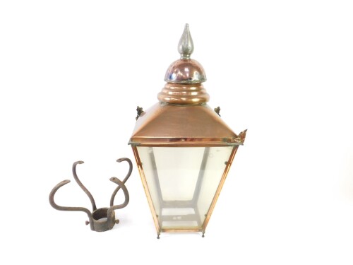 A Victorian copper and glass panelled lantern, with a cast iron pillar support, 36cm W, 108cm H.