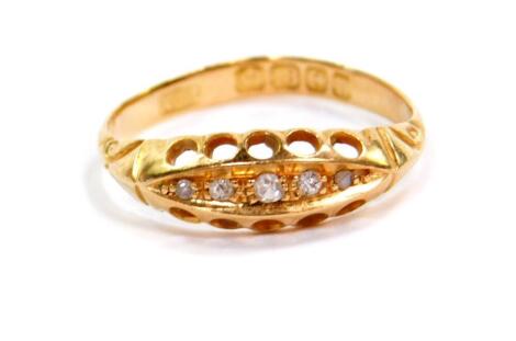 A Victorian 18ct gold and diamond ring, channel set with five diamonds, size 0, 2.2g.
