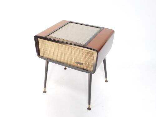 A 1950's Murphy A492 radiogramme, the tambour fronted top opening to reveal a cream record player, 73.5cm H, 66cm W, 51.5cm D.