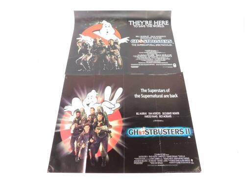 A Ghostbusters Quad film poster, They're Here To Save The World, printed by W E Bury Ltd, Bradford., together with Ghostbusters II, The Superstars of the Supernatural Are Back.