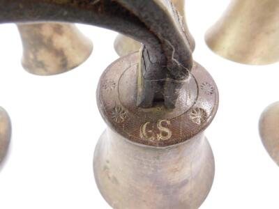 Eight hand bells, two bearing hammers, with leather handles inscribed with initials G S. - 3