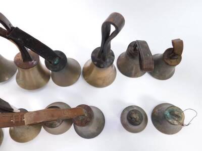 Assorted hand bells, some with hammers, most with tooled leather handles. (19) - 4