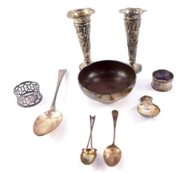 A George III silver tablespoon, Peter, Ann and William Bateman, London 1800, George VI silver and Bakelite sugar bowl, Birmingham 1944, two napkin rings, and two teaspoons, silver shell pattern caddy spoon, Birmingham 1973, and a pair of loaded silver spi