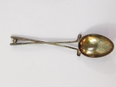 A George III silver tablespoon, Peter, Ann and William Bateman, London 1800, George VI silver and Bakelite sugar bowl, Birmingham 1944, two napkin rings, and two teaspoons, silver shell pattern caddy spoon, Birmingham 1973, and a pair of loaded silver spi - 4