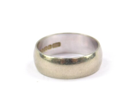 An 18ct white gold wedding band, size L, 4.4g.