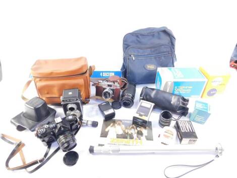 A Zenit EM camera, Halina Viceroy camera, Halina Super 8 camera, electronic flash and sundries. (qty)