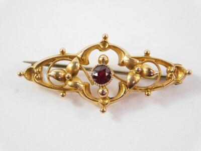 A 9ct gold and amethyst brooch formed as thistles, together with a Victorian 9ct gold and garnet set brooch, 5.1g. (2) - 2