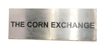 A metal fronted wall sign for The Corn Exchange, 97cm H, 267cm W.