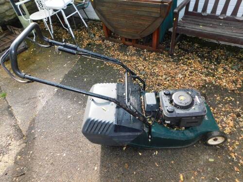 A Hayter Harrier 48 petrol lawn mower, with electric start and Briggs & Stratton motor, with keys.