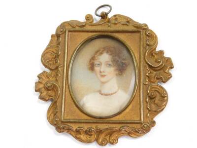 An early 19thC portrait miniature, paper label verso, Louisa, Wife Of Thos. Legh, Adlington, Married Second Thos. Americus Third Lord Erskine, 49mm x 37cmm.