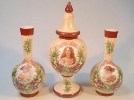 A Victorian cream opaque glass garniture