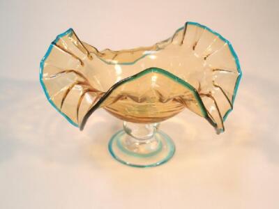 An early 20thC Italian amber and blue wavy glass bowl