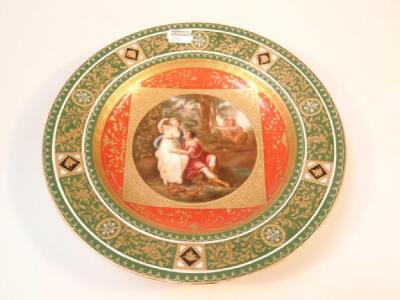 An early 20thC Vienna porcelain cabinet plate with hand painted central