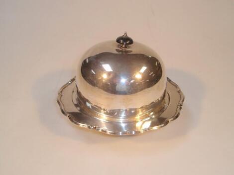 A George V silver muffin dish and cover Sheffield 1930