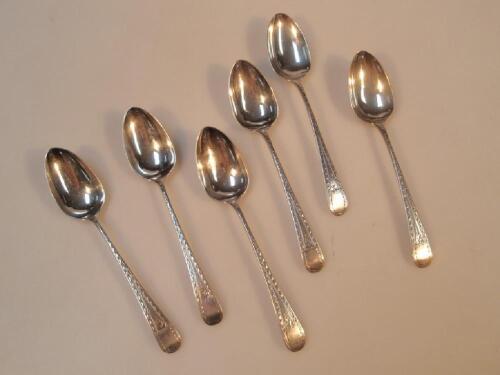 A set of six Georgian bright cut silver coffee spoons