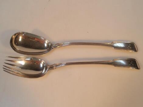 A matched pair of fiddle and thread silver servers by Charles Eley and