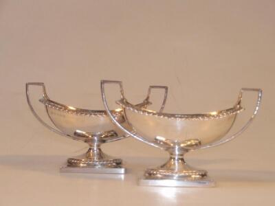 A pair of George III silver boat shape salts by Rebecca Emes and Edward Barnard