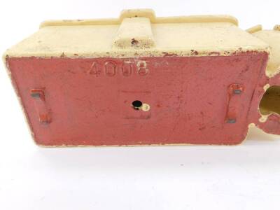 A Blackstone & Company Ltd Stamford early 20thC cast metal tool box, with oil can holder, cream painted with raised red painted lettering, No 3922 to base of lid, 11cm H, 34cm W, 12cm D, together with a Blackstone cream painted spanner. (2) - 4