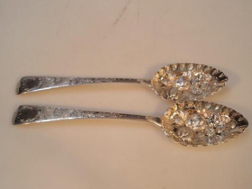 A pair of George III silver berry spoons by Thomas Wallis and Jonathan Hayne