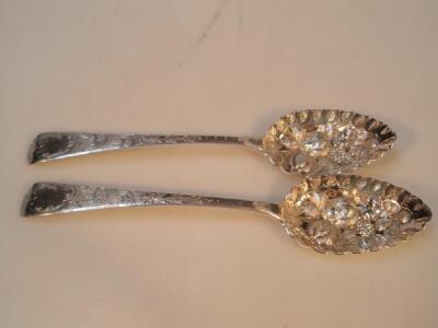 A pair of George III silver berry spoons by Thomas Wallis and Jonathan Hayne