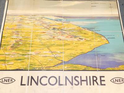 An LNER Lincolnshire panoramic map, set no 6, Bacon's British Isles rainfall and isobars wall atlas, etc., trench lighter, spirit level, etc. (qty) - 2