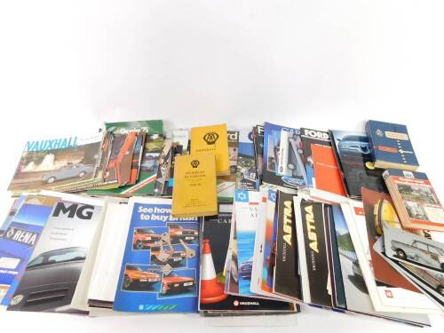 Automotive ephemera and books, to include Vauxhall car brochures, AA hand books, AA and RAC keys, RAC handbooks, etc. (1 box)