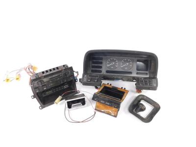 Jaguar car parts, to include dashboard instrument cluster, centre console with radio, radio and cassette player. (1 box)