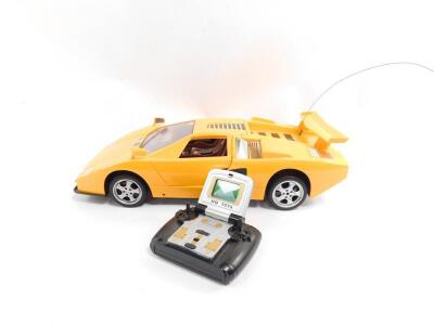 A MAX LC radio controlled orange Ferrari, Hi-Speed Super, No.HQ9013, with controller.