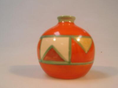 A small Clarice Cliff 'Bizarre' spherical vase painted with a band of geometric