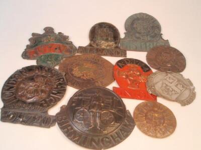 Assorted pressed metal fire marks