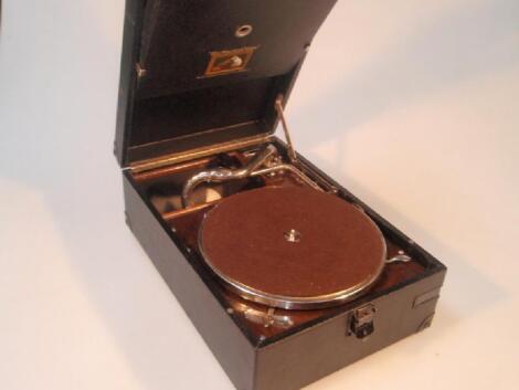 A 'His Masters Voice' wind-up portable gramophone