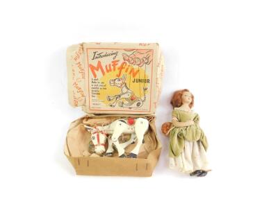 A Muffin The Mule Junior, boxed, together with a cloth doll modelled as Nell Gwynn, holding a basket of oranges, 20cm H. (2)