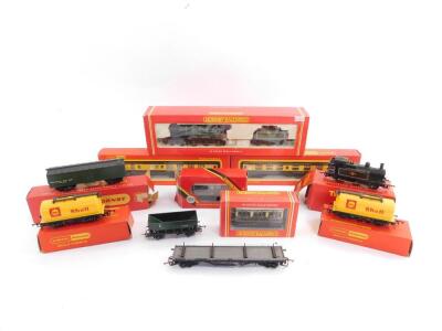 An Hornby OO gauge B12/3 locomotive, LNER green livery, 4-6-0, 8579, R284, two GWR coaches, a Hornby shunting engine, BR black livery, 47606, boxed and unboxed. (11)