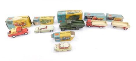 Six Corgi die cast vehicles, comprising Land Rover Breakdown Truck 417, Morris Mini Cooper 227, Dropside Trailer 100, Bentley Continental Sports Saloon 224, Commer (5 ton) Dropside Lorry 452, and an International 6x6 Army Truck 118, all boxed. (AF)