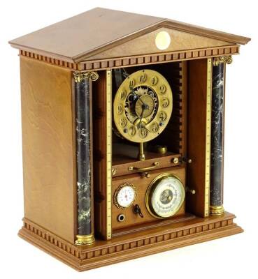 An unusual clock and weather station, housed in a cabinet previously containing the Millennium coin collection, the interior fitted with a clock, barometer and thermometer etc., 33cm W.