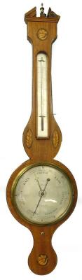 L and D Soleha, Hull. A mid 19thC mahogany boxwood and ebony strung wheel barometer, with engraved dial, inlaid with shells, etc., 98cm L.