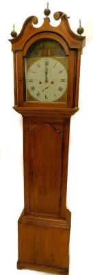 Michie, Brechin. An early 19thC longcase clock, the arched dial painted with a lady and two young girls, with church in the foreground, above four floral spandrels, eight day four pillar movement in oak and mahogany case, 212cm H.