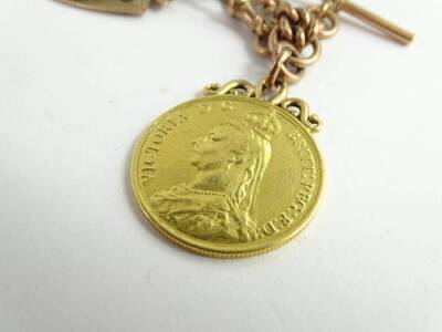 A 9ct gold watch chain with double sovereign and shield fob, the Victorian double sovereign dated 1887, with 9ct gold shield fob with vacant cartouche, on 9ct gold flat curb link chain, with clip and t-bar, 65.4g all in, the chain 41cm long. - 2