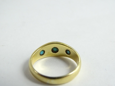 A Victorian 18ct gold turquoise ring, set with three turquoise stones, the central stone star set, ring size N½, 5.1g all in, in W.Marshall box. - 2