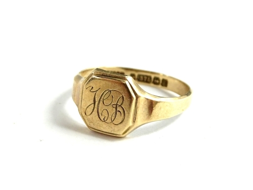 A 9ct gold signet ring, with octagonal shield ring head, bearing initials HB, ring size U, 3.2g.