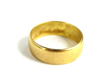 A thick 22ct gold wedding band, ring size P, maker P&W, 6.3g.