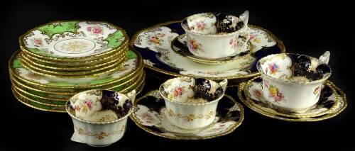 A collection of Coalport batwing pattern porcelain, each printed and painted with flowers in green and navy, etc.