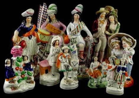 A collection of 19thC Staffordshire figures, to include Scottish ladies, etc.