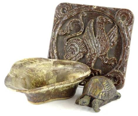 A collection of items, to include a stoneware tortoise doorstop, shaped studio bowl and a plaque. (3)